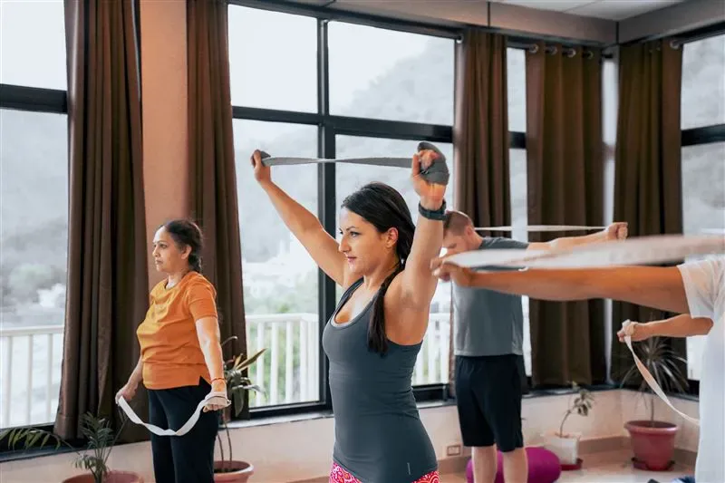 Props strap alignment yoga class